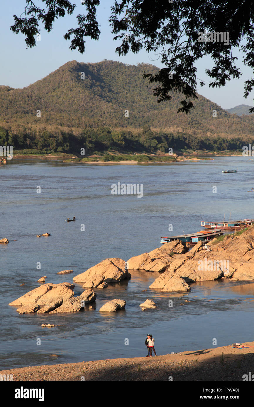 Terrace overlooking the Mekong river with fishing pole lamp posts in Luang  Prabang, Laos Stock Photo - Alamy