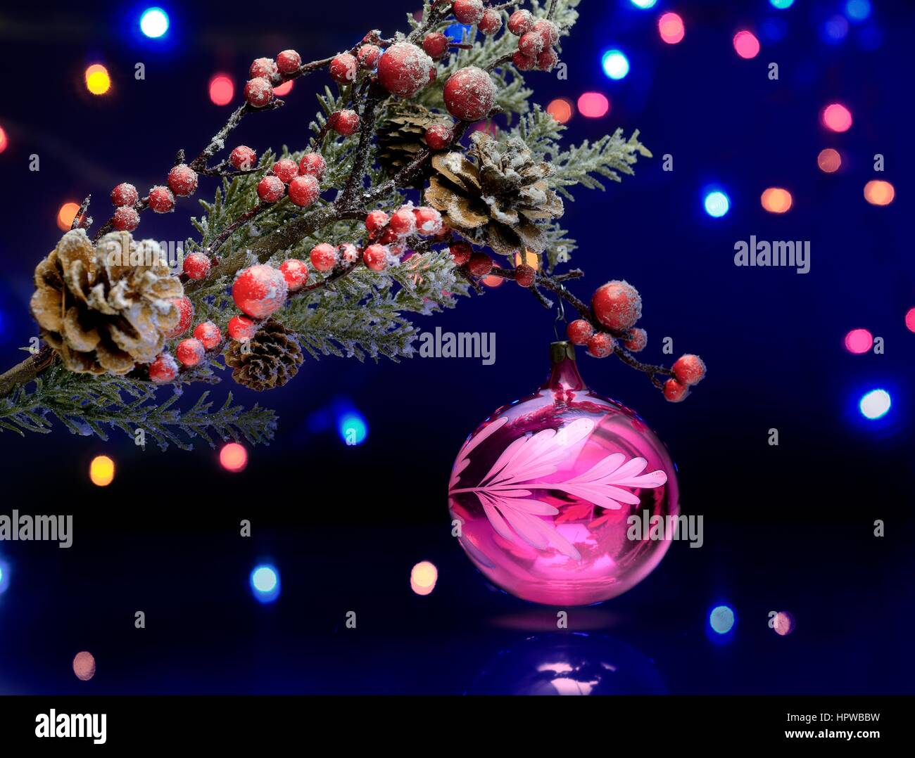 Christmas tree branch with decoration ball. Sparkling and fairy