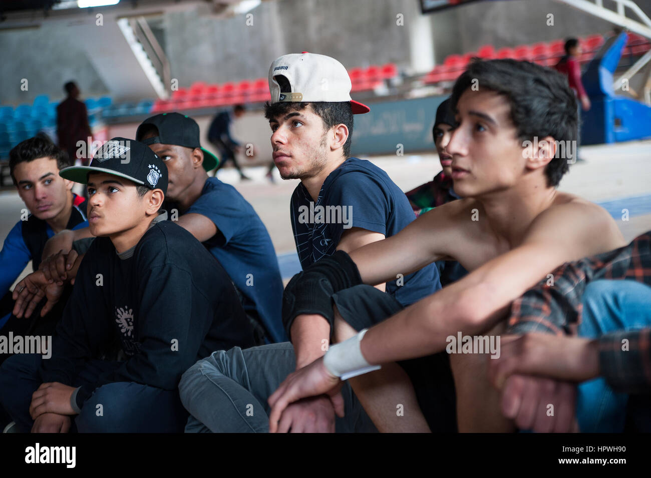 Libya, Tripoli: Breakdancers are practising in an unused baskeball hall. Stock Photo
