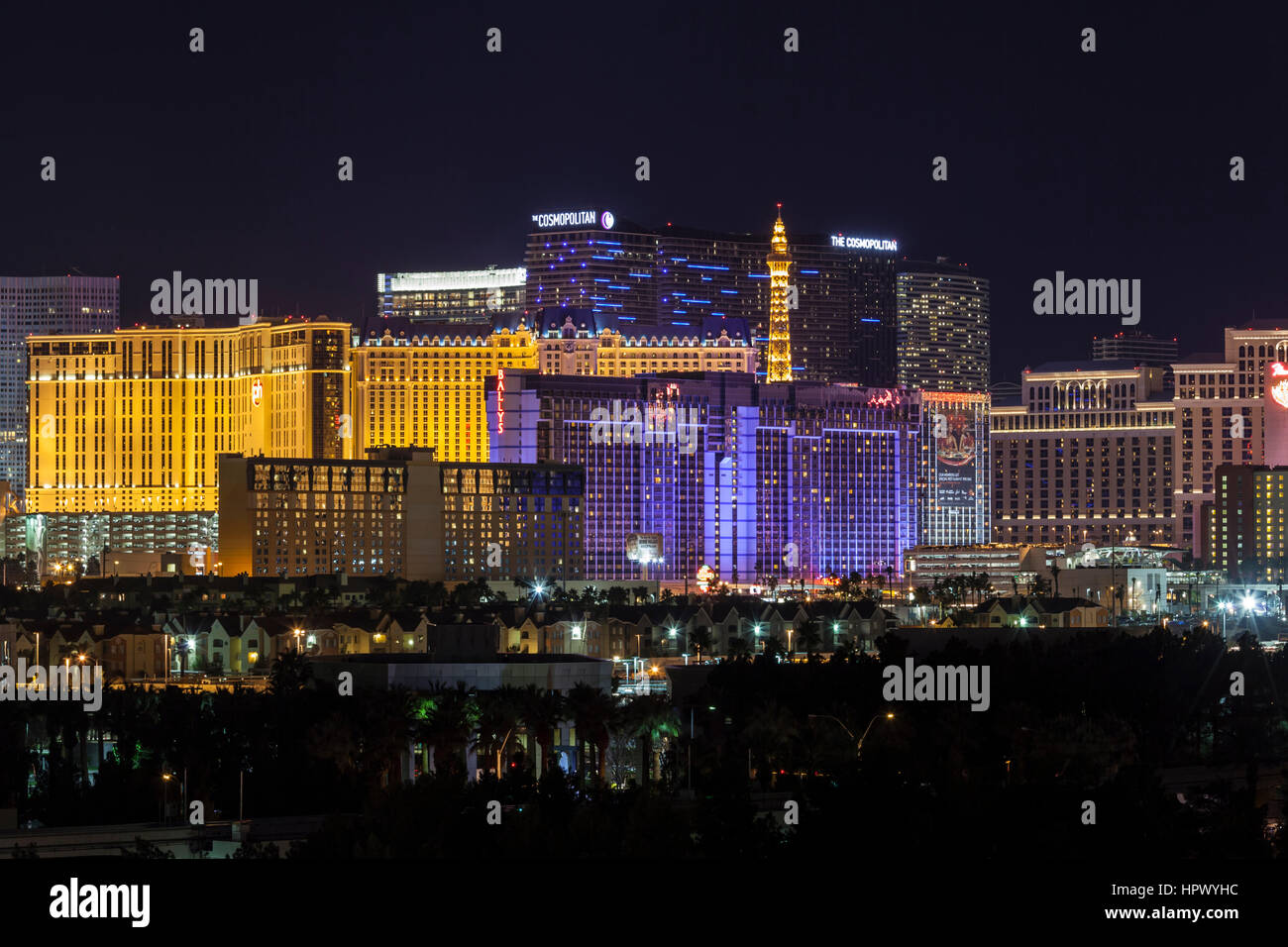 Editorial night view of Cosmopolitan, Ballys, Paris and other casino resorts on the Las Vegas strip. Stock Photo