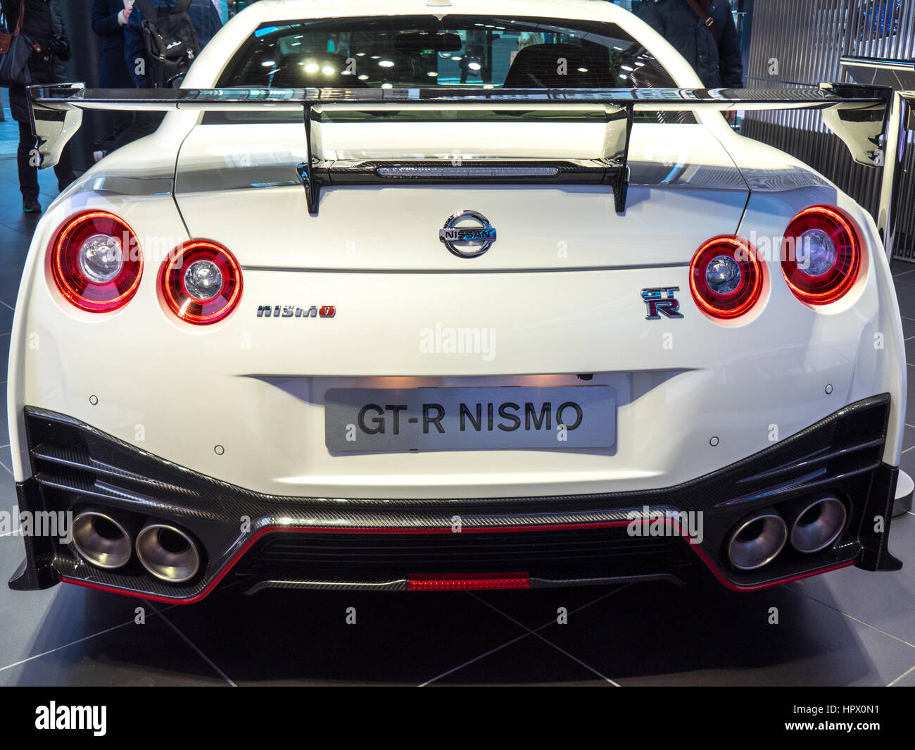 A white Nissan GTR vehicle on display in the marquee showroom, Nissan Gallery in Ginza, Tokyo. Stock Photo