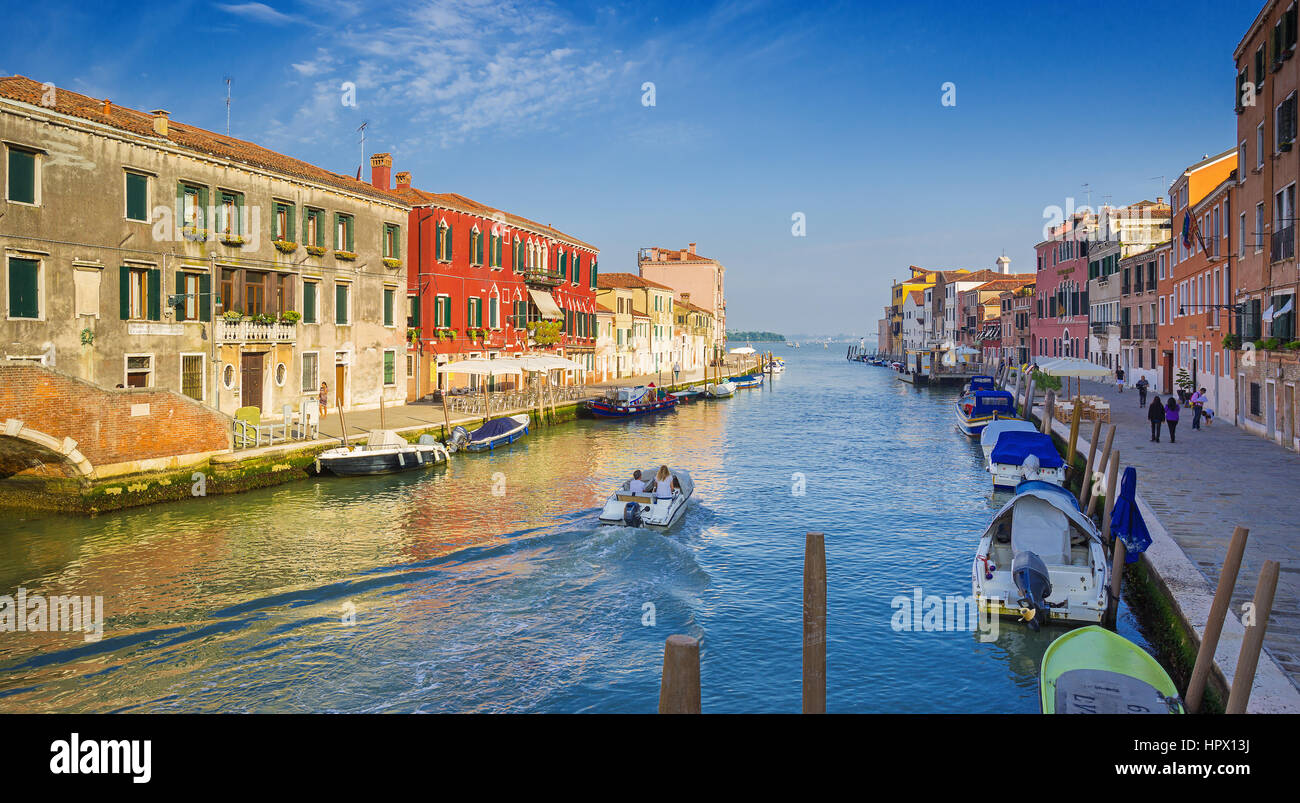VENICE,ITALY-MAY 28, 2016: View on canal with gondolas in romantic Venice,Italy Stock Photo