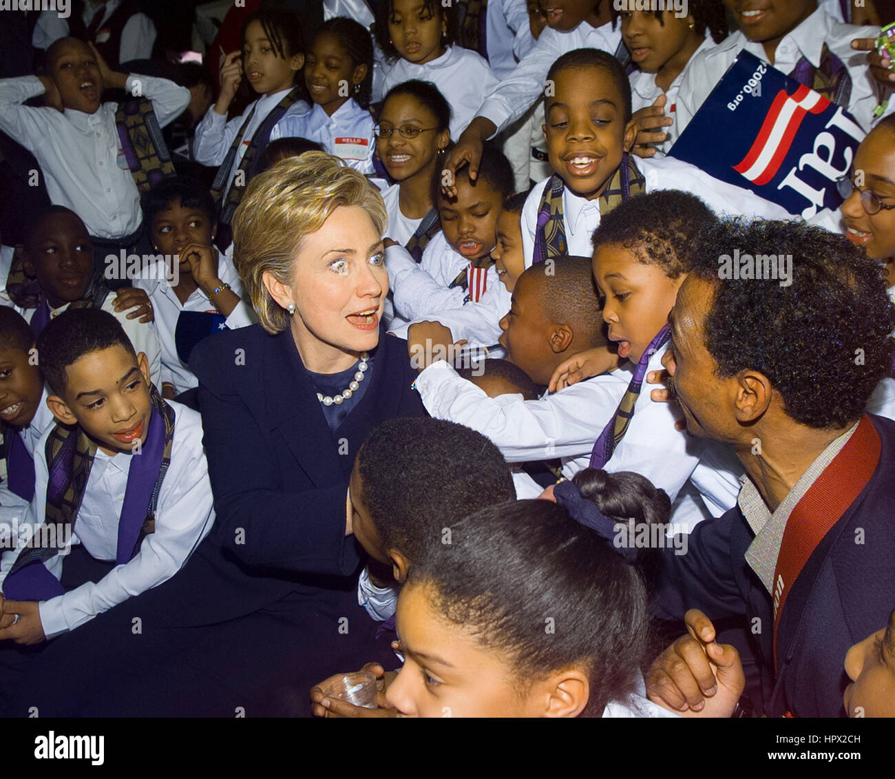 First Lady Hillary Clinton talks to students of Hanifah Children's Choir of Brooklyn before officially announcing her candidacy for the Democratic US Senate seat from New York at the State University of New York Purchase College in Purchase, New York,  February 6, 2000. Clinton is the first wife of a US president to seek elected office. Photo by Francis Specker Stock Photo