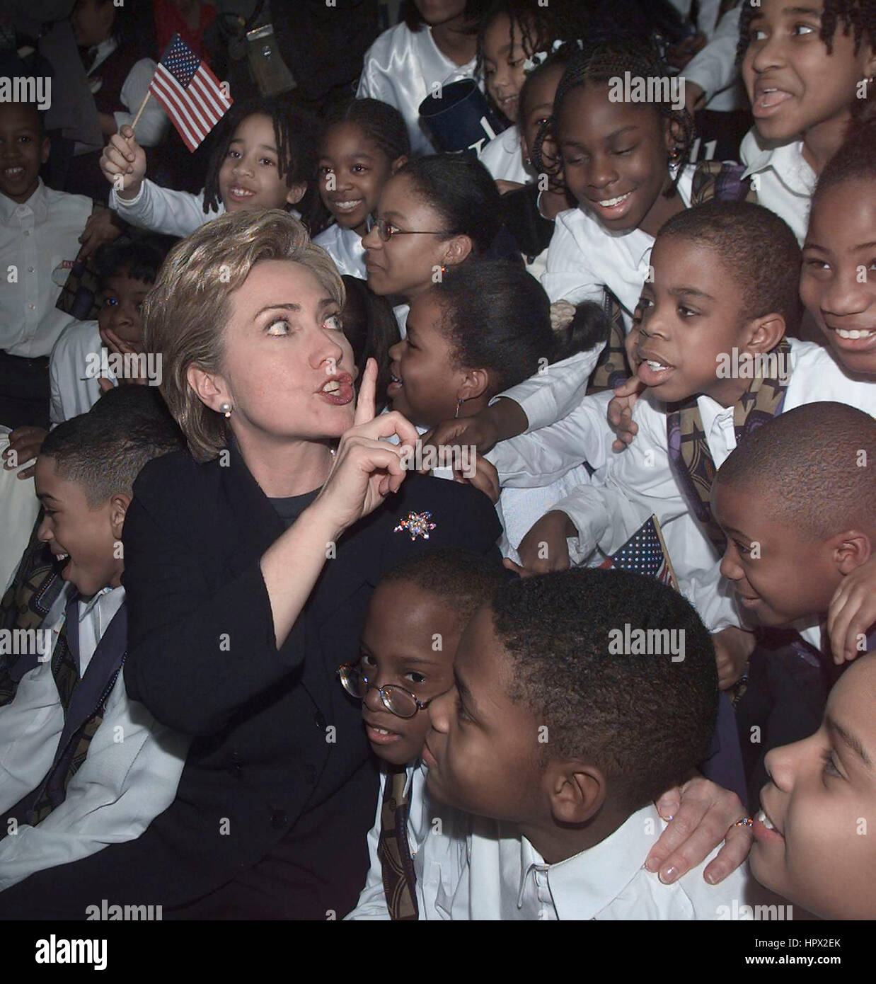 First Lady Hillary Clinton talks to students of Hanifah Children's Choir of Brooklyn before officially announcing her candidacy for the Democratic US Senate seat from New York at the State University of New York Purchase College in Purchase, New York,  February 6, 2000. Clinton is the first wife of a US president to seek elected office. Photo by Francis Specker Stock Photo