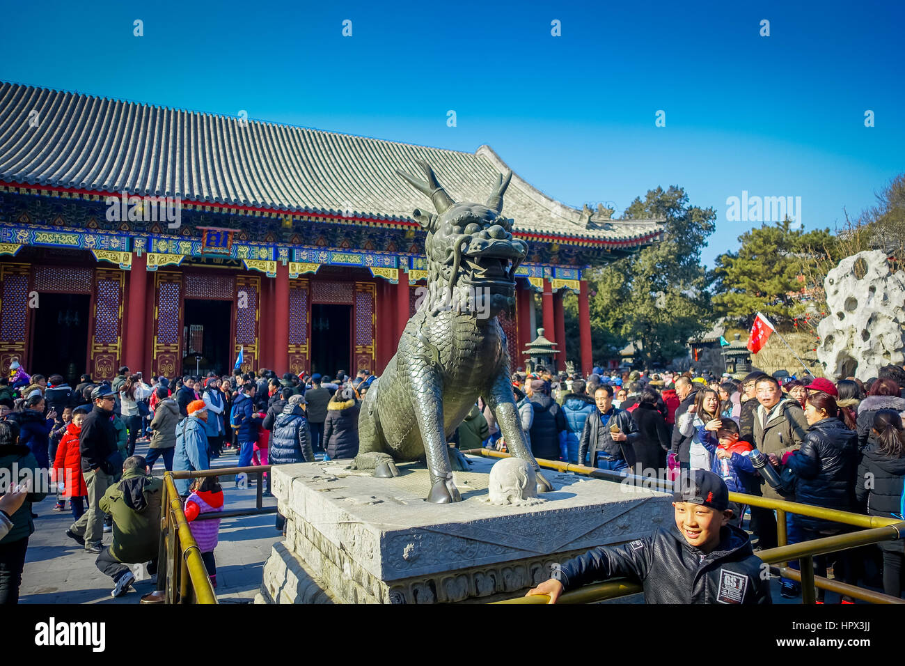 BEIJING, CHINA - 29 JANUARY, 2017: Tourists lining up for entrance into spring palace, a spectacular ensemble of lakes, gardens and ancient chinese pa Stock Photo