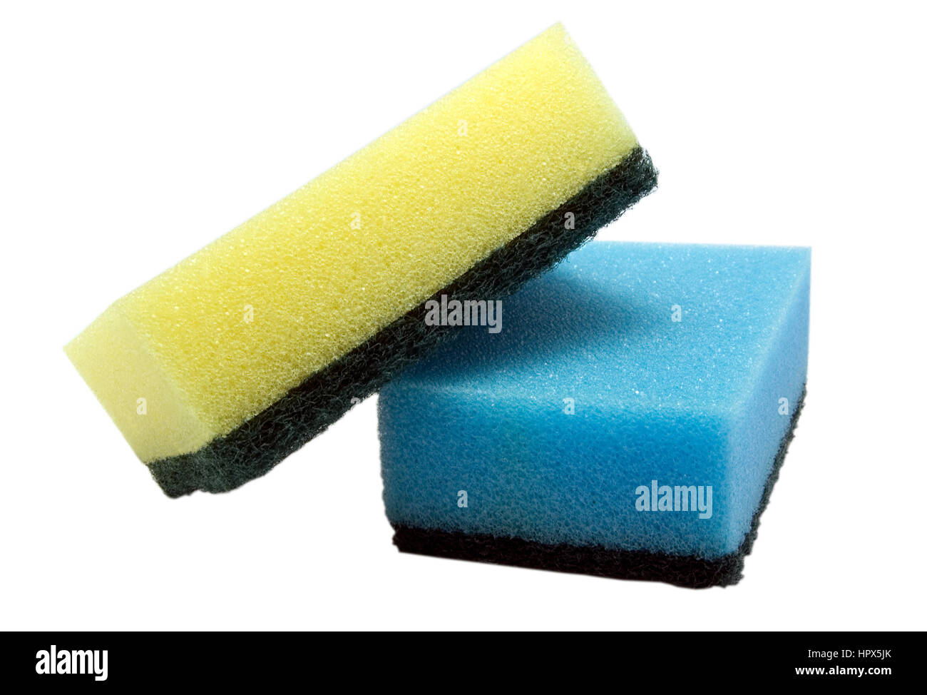 Pair of sponges, green, blue, yellow, two isolated sponge stack macro closeup Stock Photo