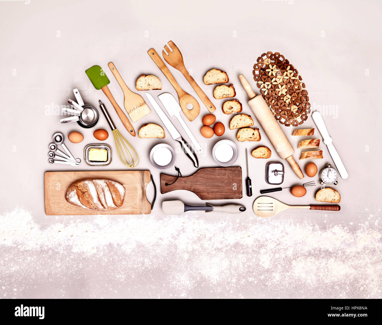 Still life concept baking utensils forming bread loaf Stock Photo