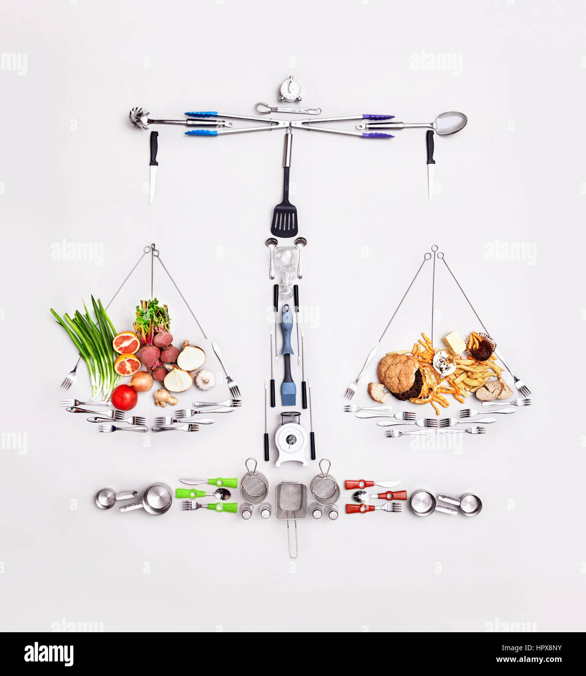 Still life concept healthy and unhealthy foods forming scale Stock Photo