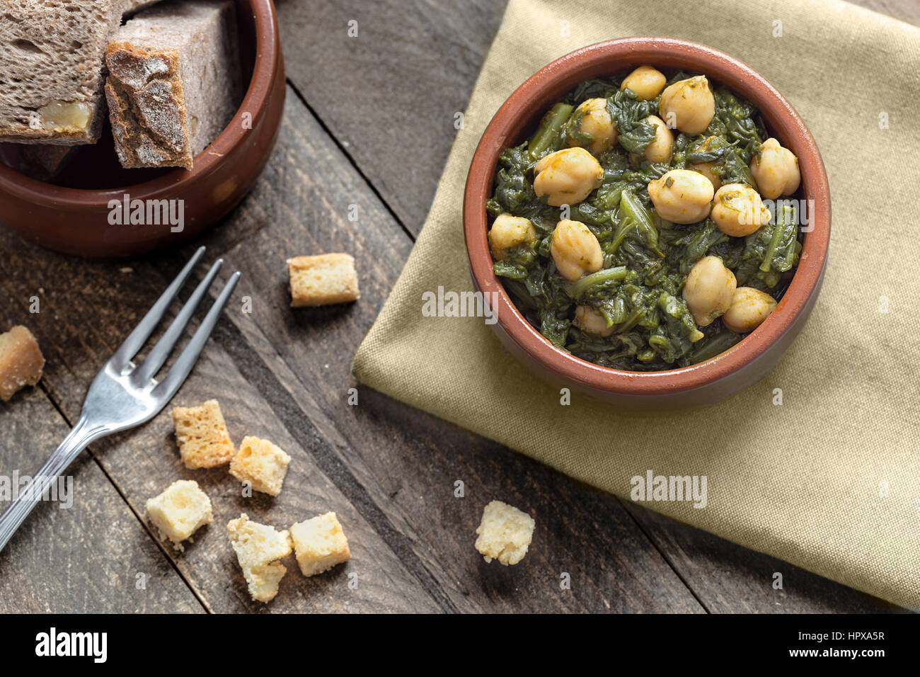 Chickpea stew with spinach. Traditional Spanish recipe Stock Photo Alamy