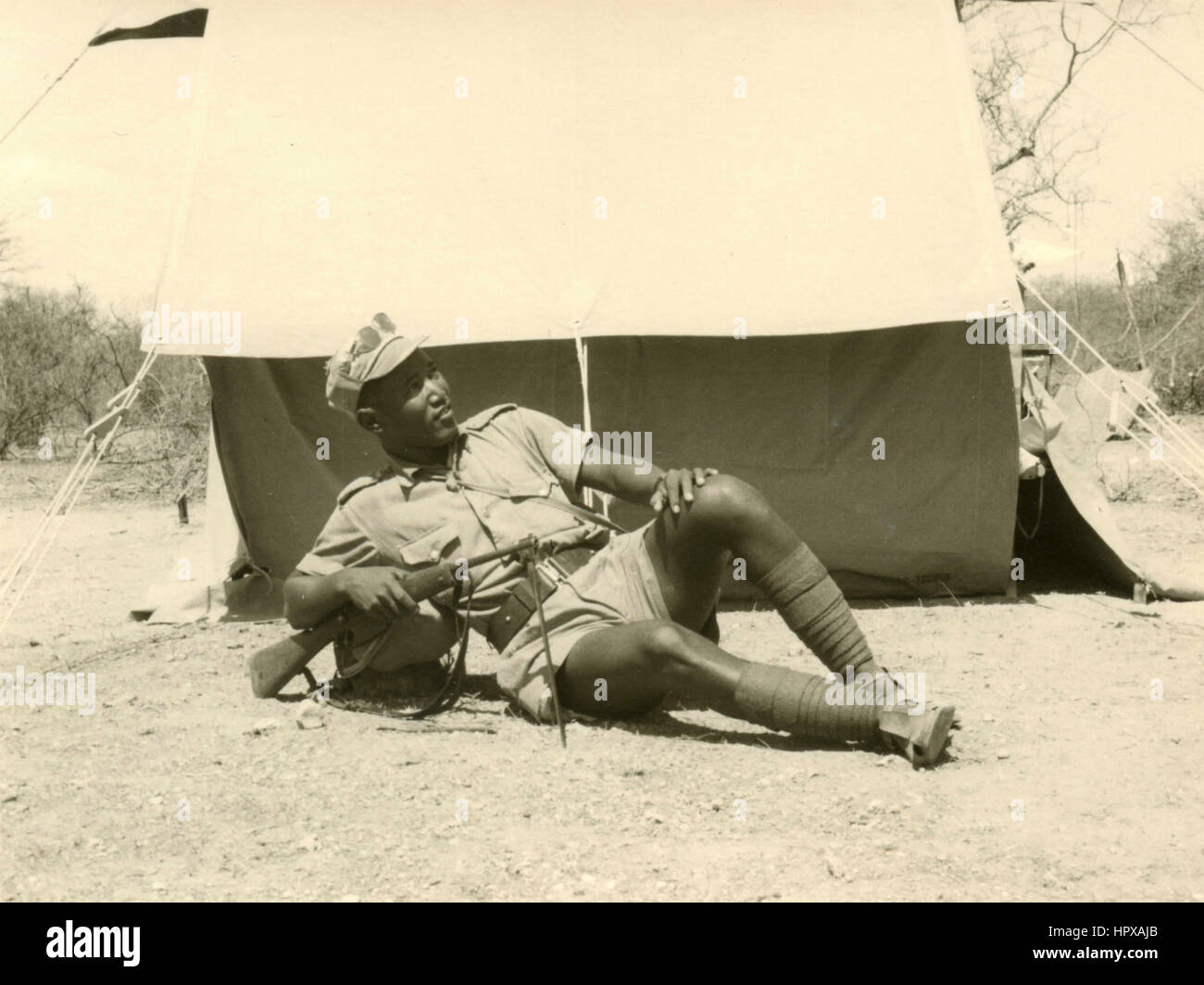 African soldier sitting hi-res stock photography and images - Alamy