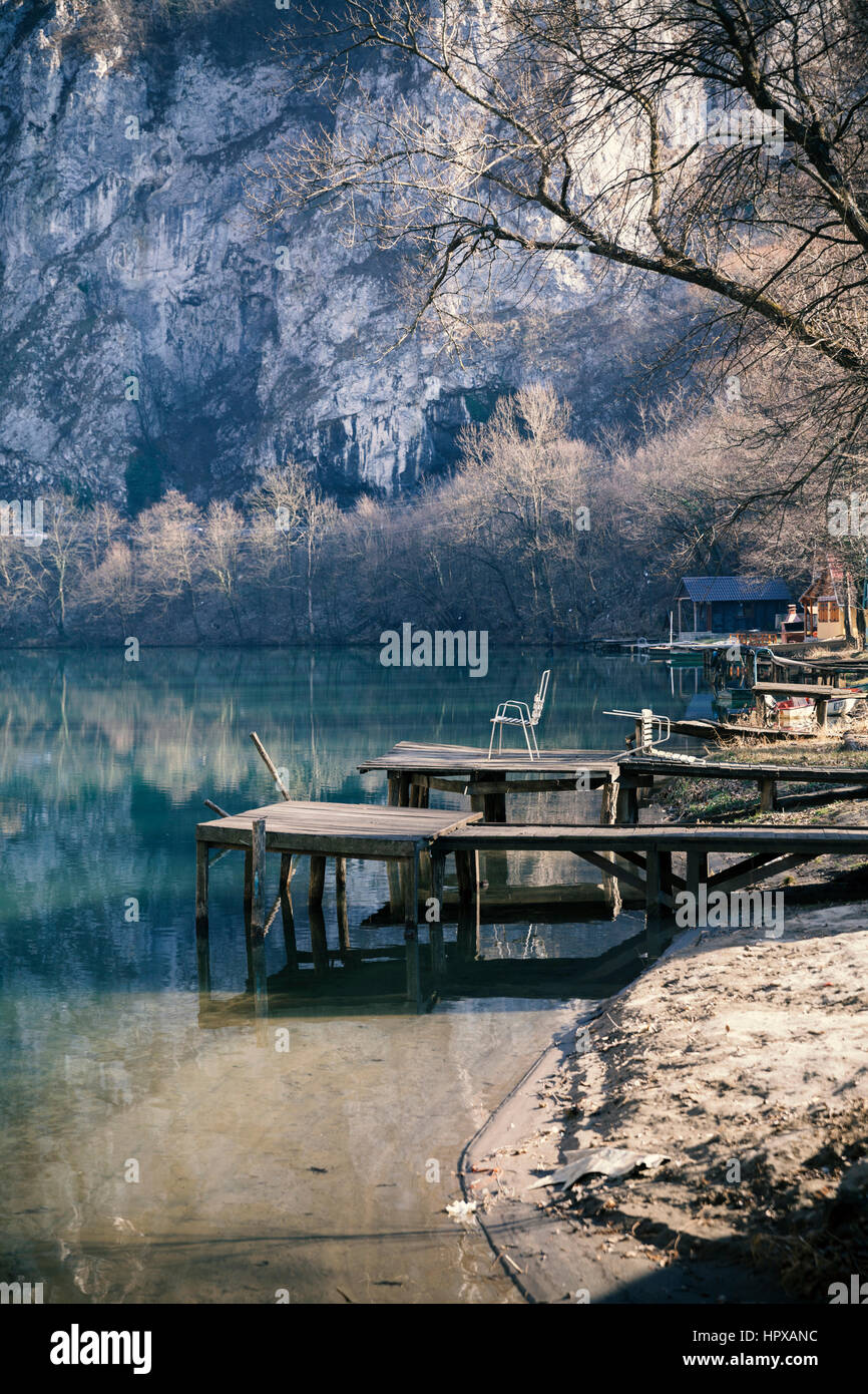 wooden docks on lake, winter scene Stock Photo