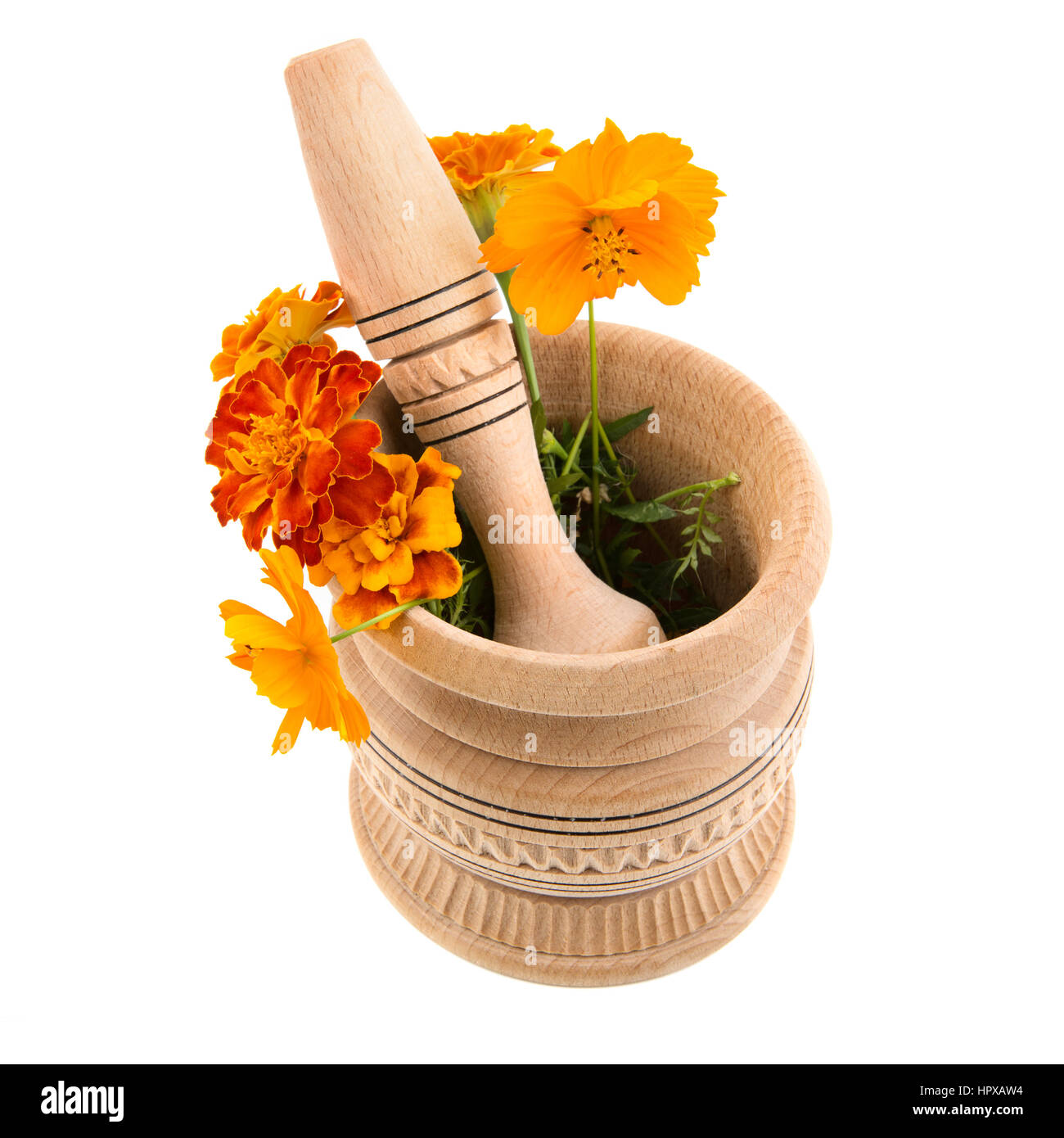 mortar and pestle for grinding herbs on a white background Stock Photo