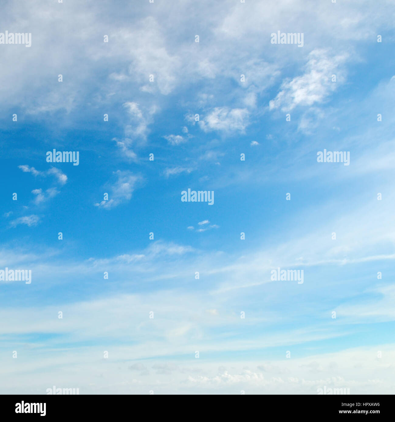 fluffy clouds in the blue sky Stock Photo - Alamy