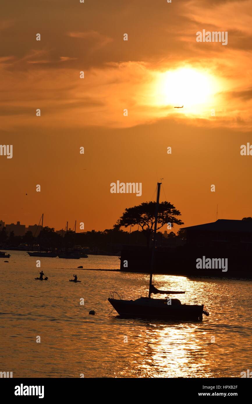 Sunset at the docks Stock Photo - Alamy