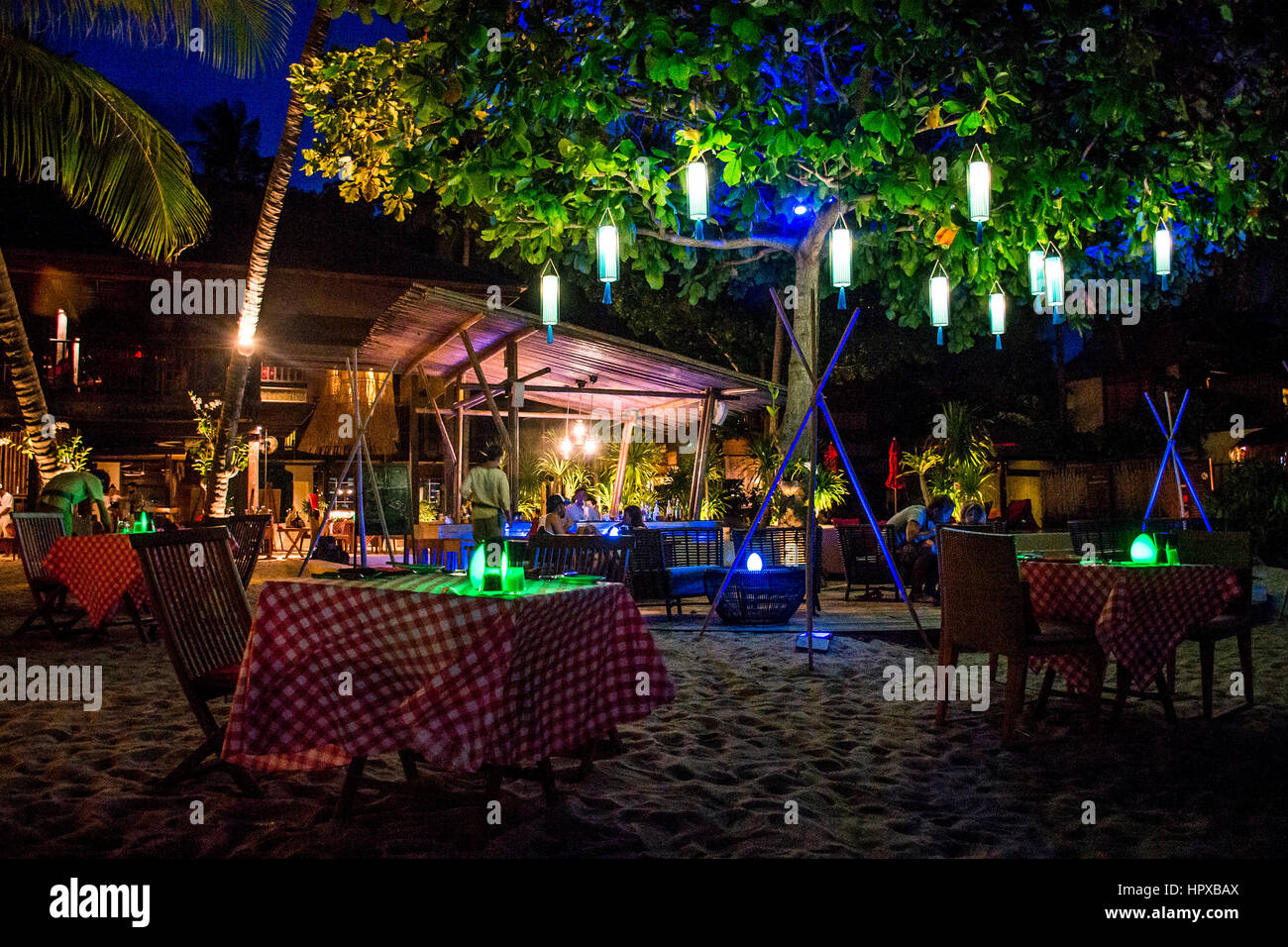 Koh Phangan thailand 26.09.2015 - Dinner underneath stars palm trees beautiful bar restaurant Stock Photo