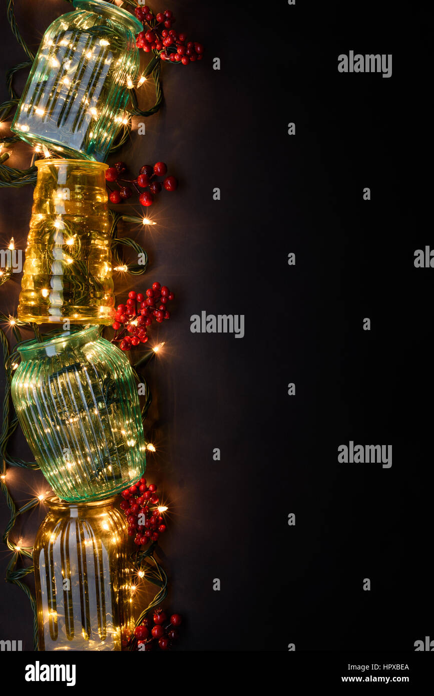 New Year Lights Garland In Glass Vases As A Decorative Frame For