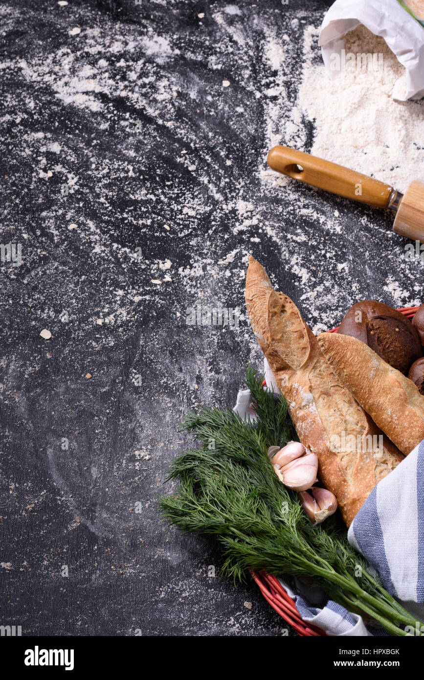 French Baguette Rye Bread And Flour On Black Chalkboard Rural