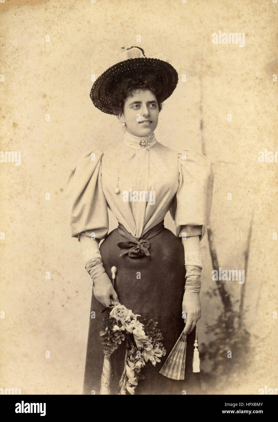 Portait of woman with flowers, Argentina Stock Photo
