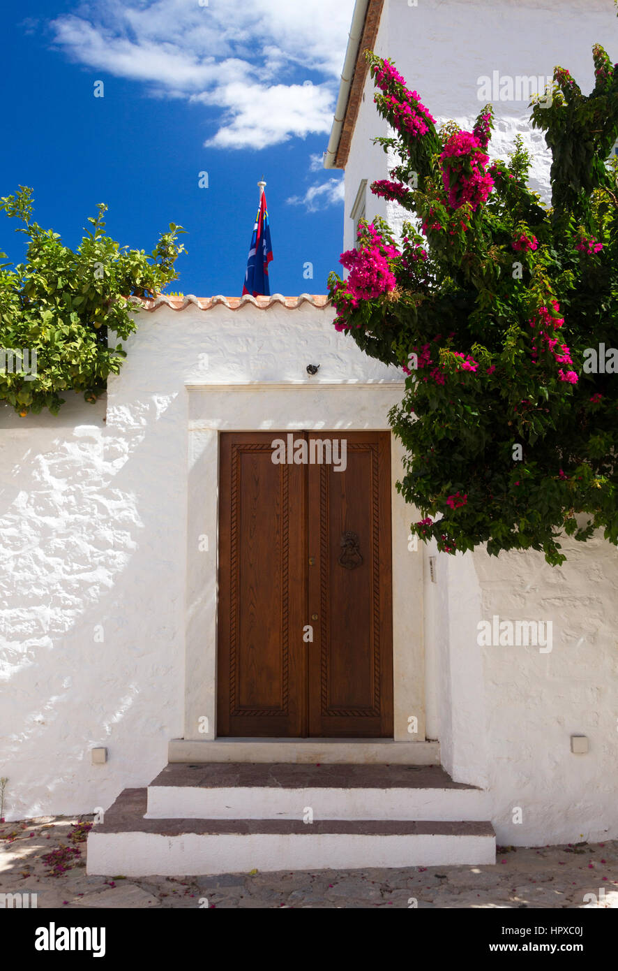 Typically traditional door entrance of a house in the town of Hydra, in Hydra island, Greece. Stock Photo