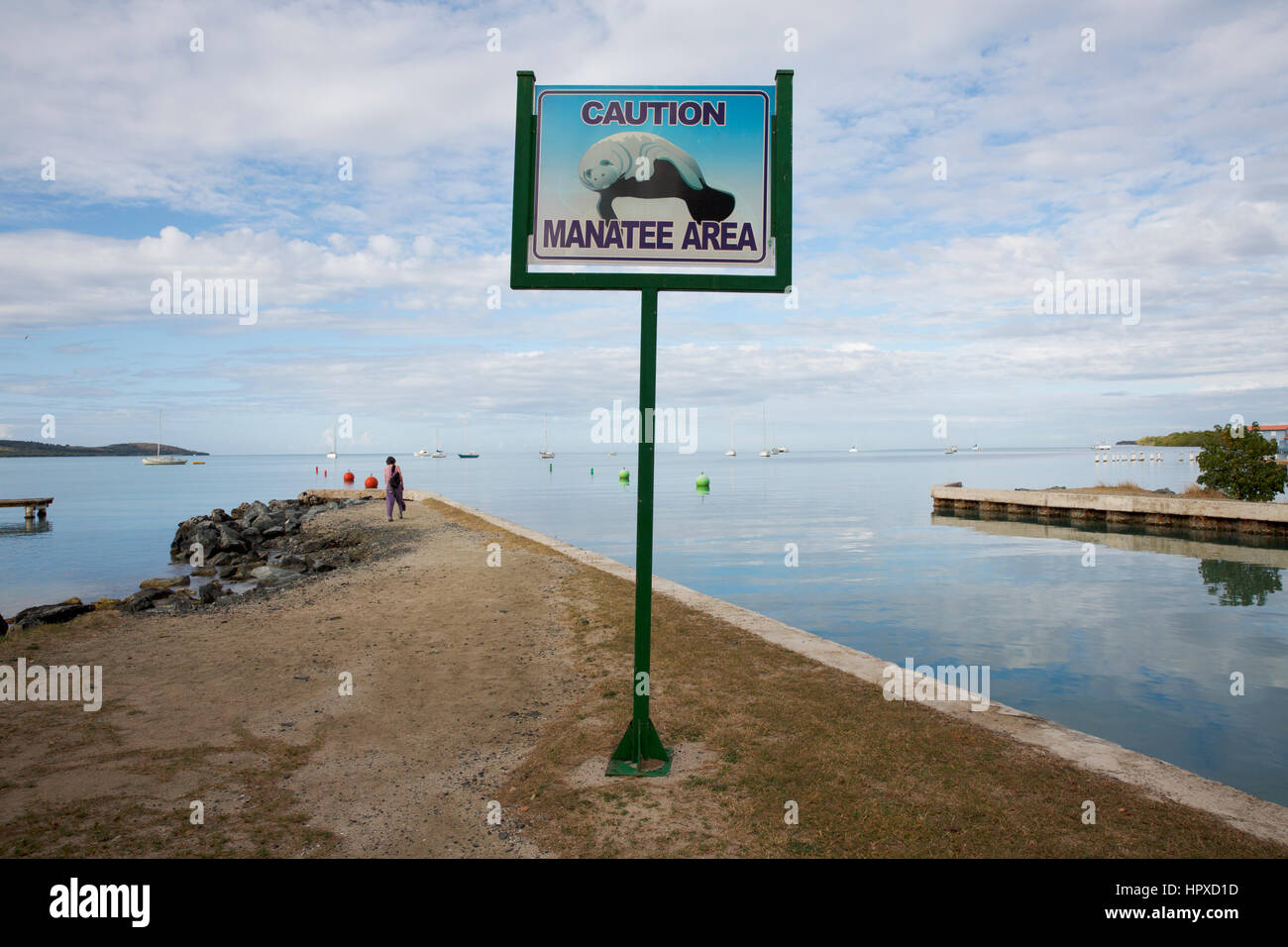 Manatee warning sign, beach, Boqueron, Puerto Rico Stock Photo - Alamy
