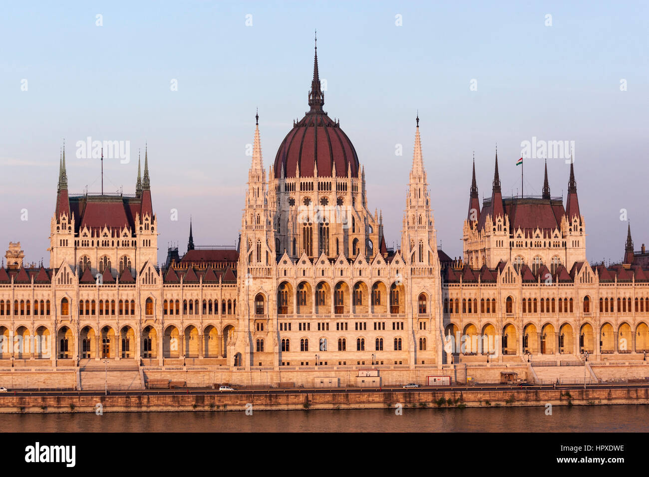 Hungarian Parliament, by Imre Steindl  architect,  at sunset light on the bank of the Danube, Budapest, Hungary Stock Photo