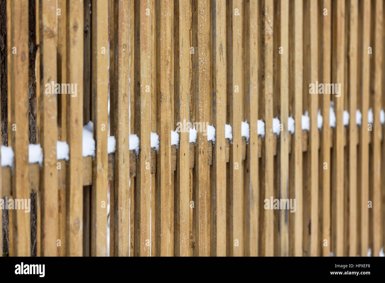 Fence with snow Stock Photo - Alamy