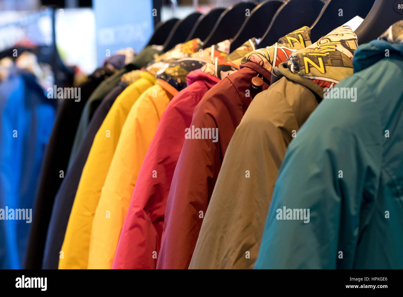 Colorful coats in perspective. MOMAD International fashion trade show IFEMA 2017 Madrid. Stock Photo
