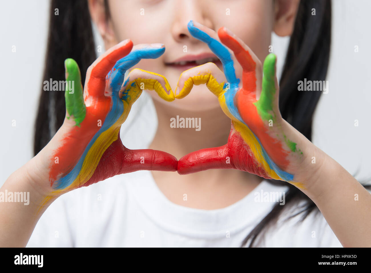 child hands painted make a heart shape Stock Photo Alamy