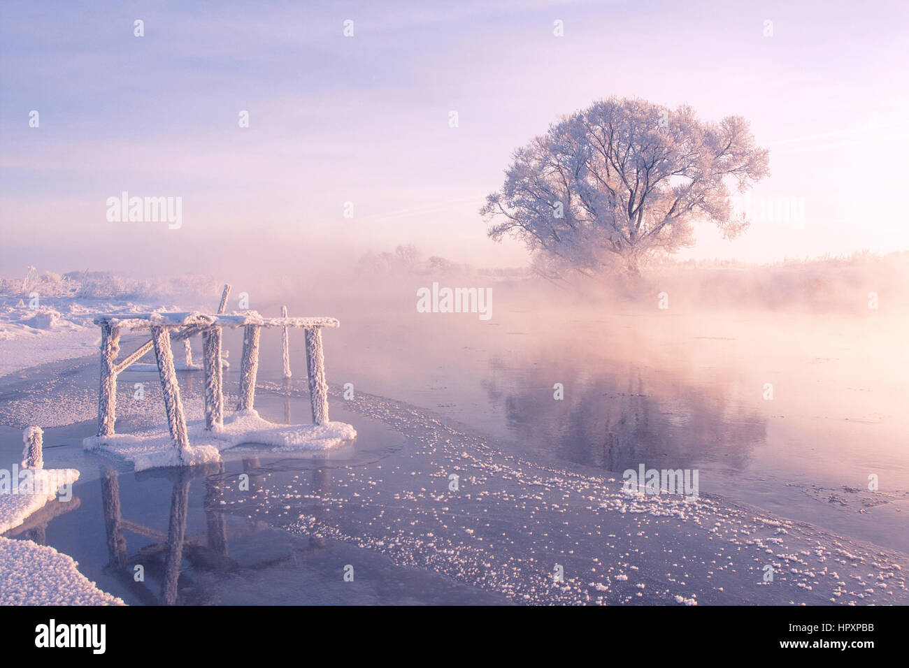 Colorful winter morning and river is about to get frozen Stock Photo