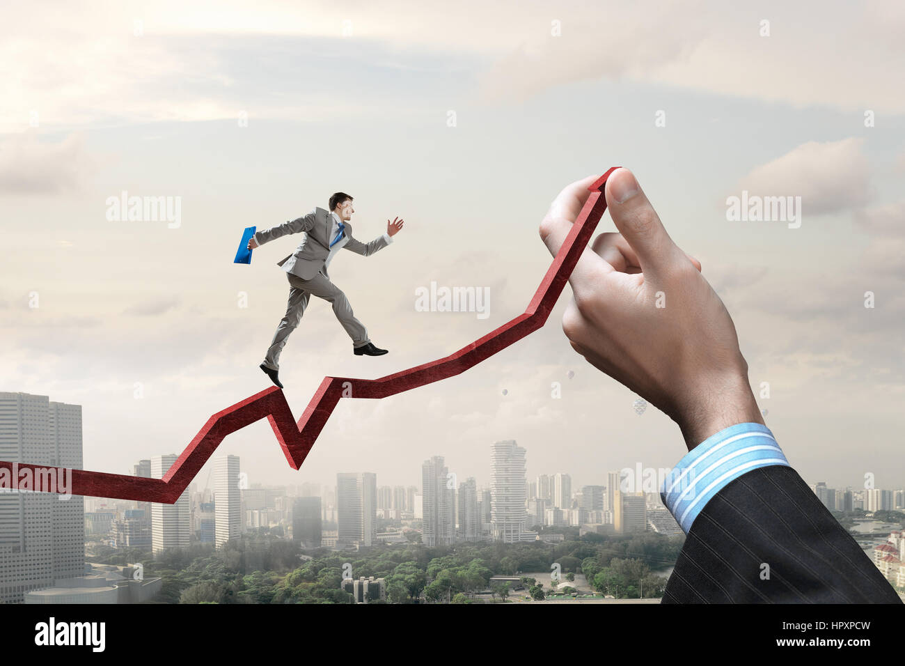 Hand holding red growing arrow and businessman running up of it Stock ...