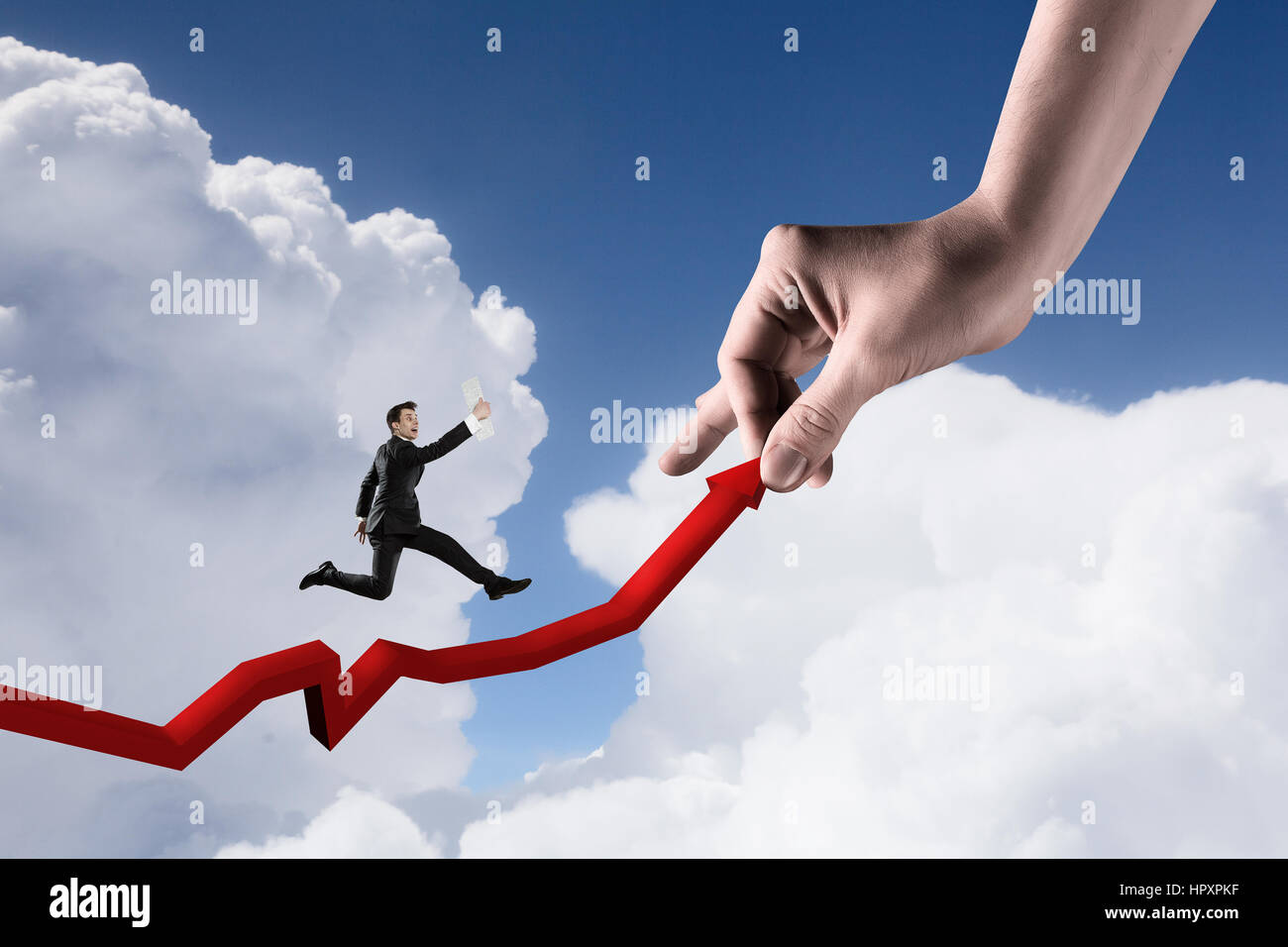 Hand holding red growing arrow and businessman running up of it Stock ...