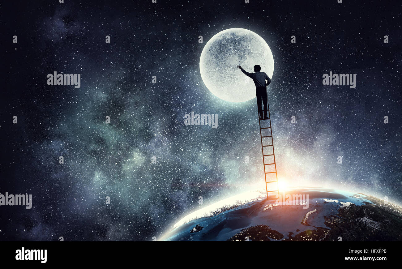 Businessman on the ladder trying to reach moon in sky. Elements of this