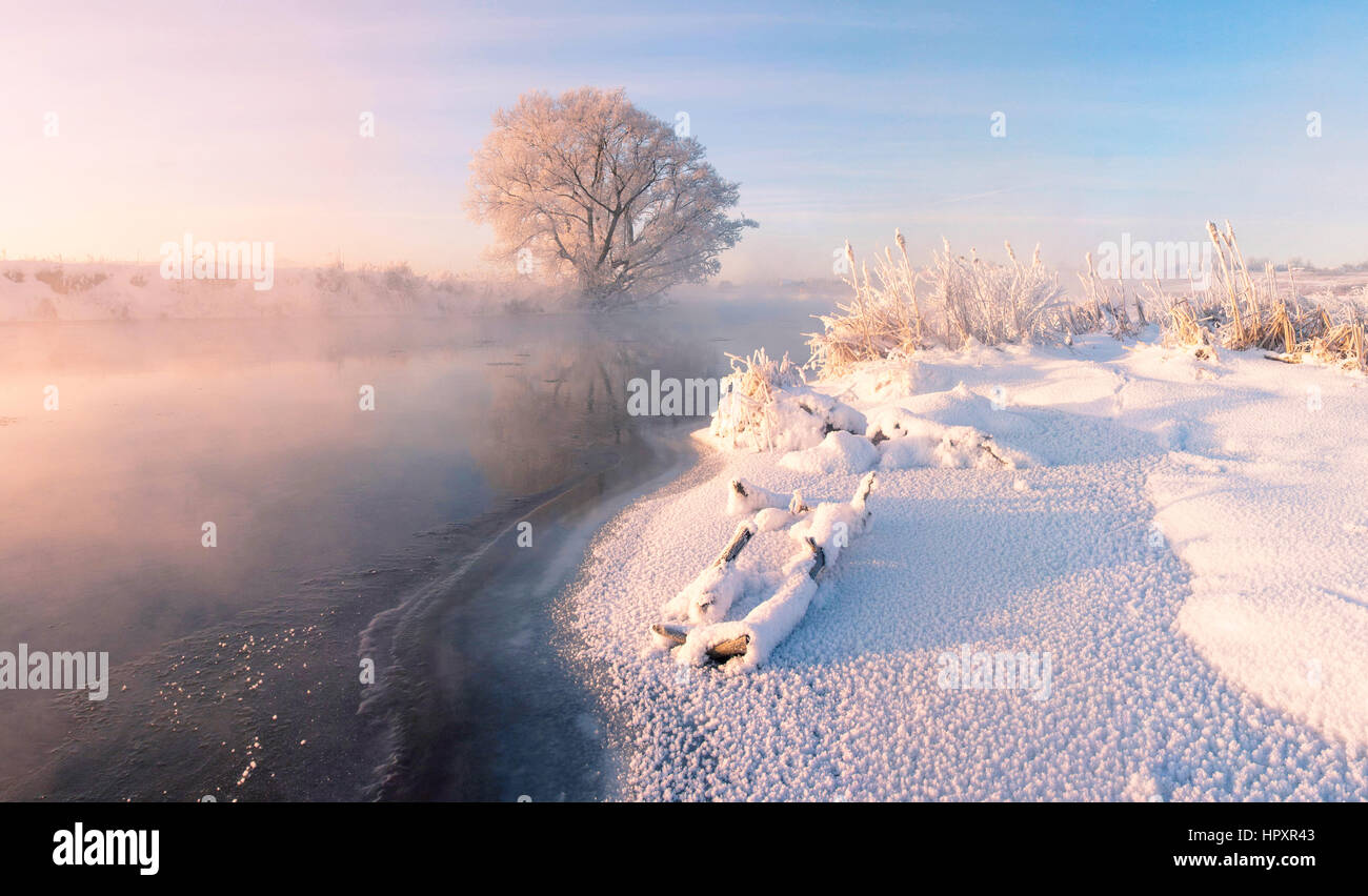 The river begins freeze in winter morning Stock Photo