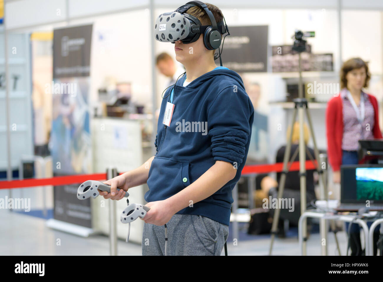 Krakow, Poland - February 23, 2017: Presentation of HTC VIVE - Virtual Reality System by 1000Realities Company during Mobile-IT Exhibition. Stock Photo