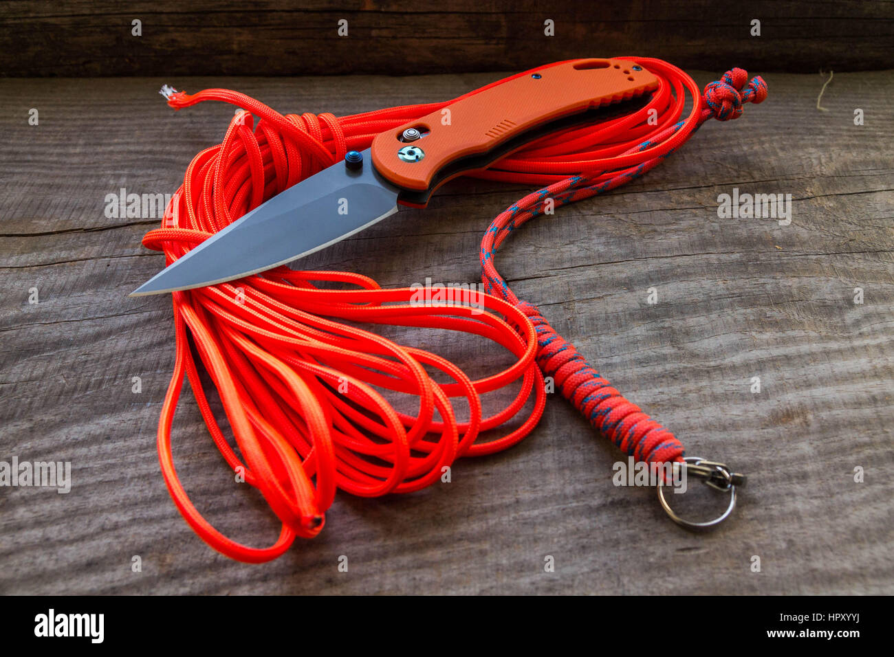 Pocket knife with an orange handle. Side view Stock Photo Alamy