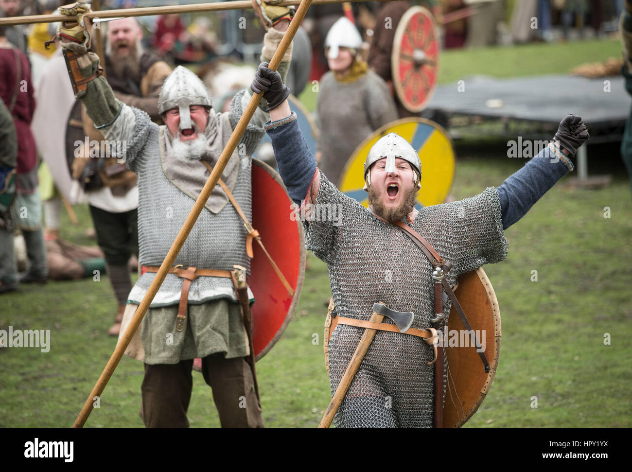 Viking re-enactors take part in a mock battle during the JORVIK Viking Festival in York, a week-long celebration of the last Viking king in the city, Eric Bloodaxe. Stock Photo