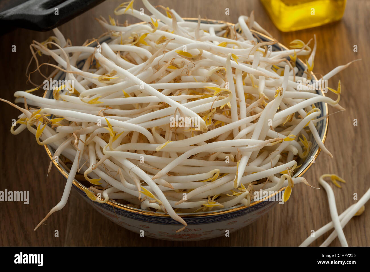 Bowl with fresh raw bean sprouts Stock Photo