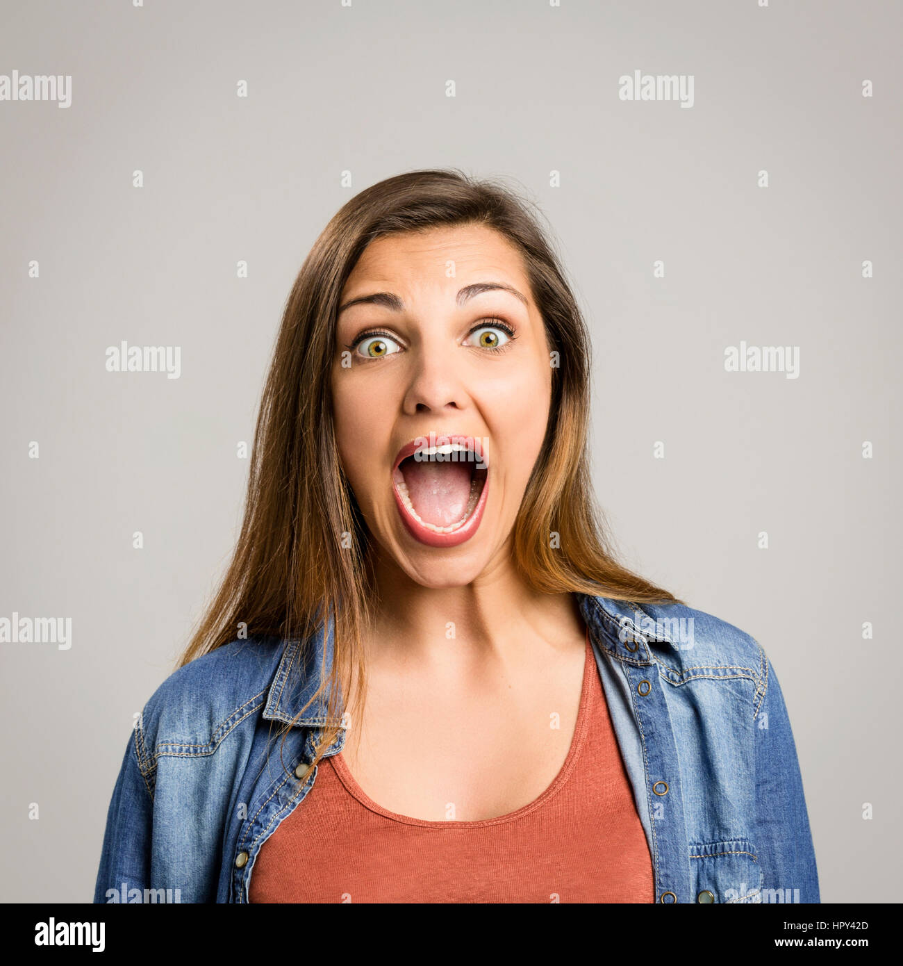 Portrait of a beautiful woman shouting very loud Stock Photo - Alamy