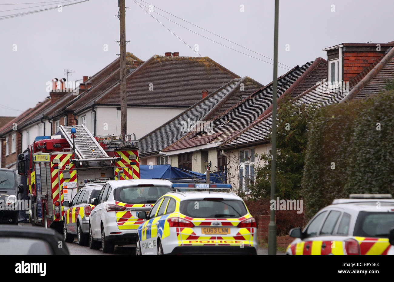 Emergency services at the scene of a house fire in which a pensioner died in Belmont Avenue, Stoughton, Guildford. Stock Photo