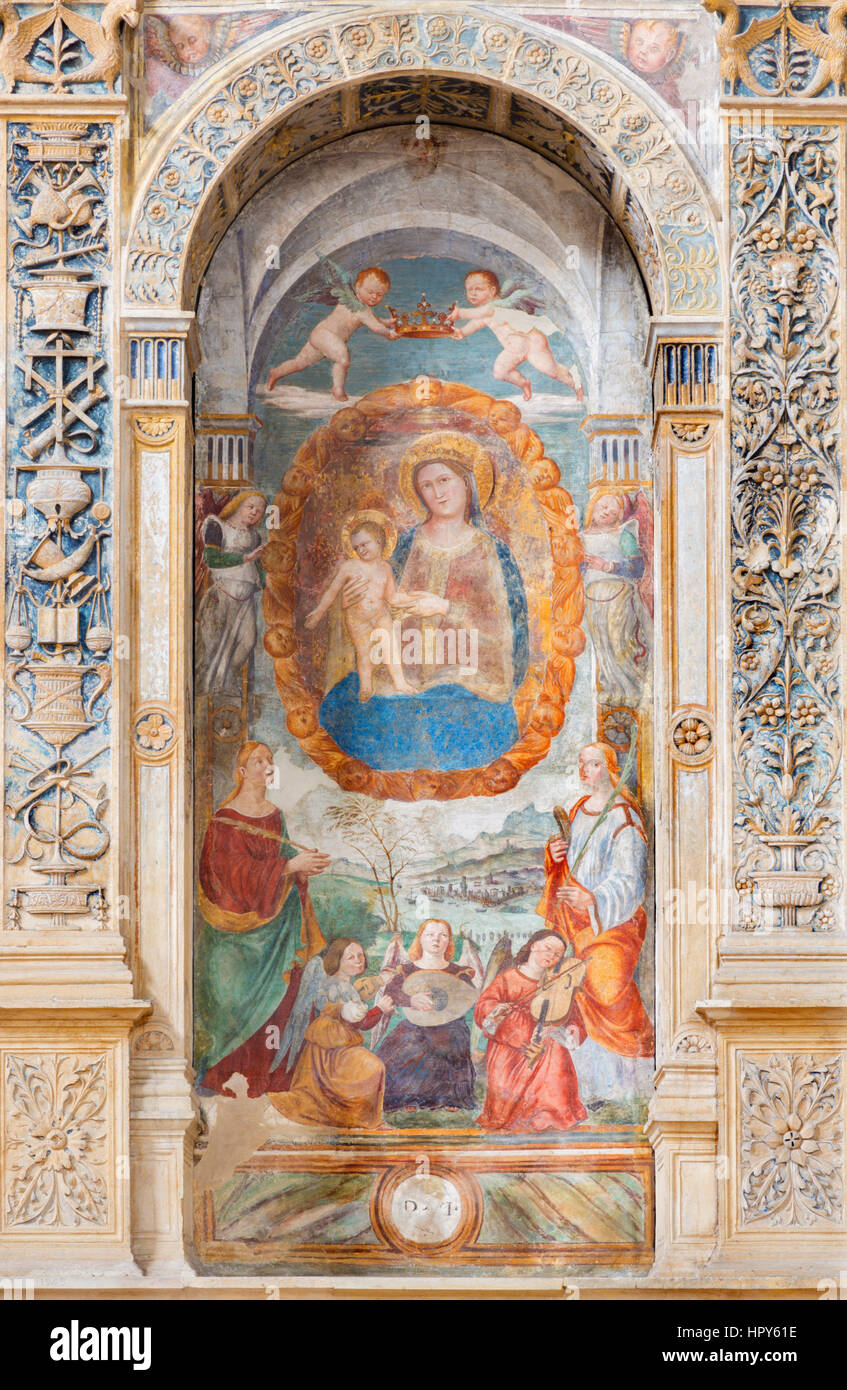 PADUA, ITALY - SEPTEMBER 9, 2014: The Madonna with the child by Bonino da Campione (14. cent.) in the church of The Eremitani (Chiesa degli Eremitani) Stock Photo