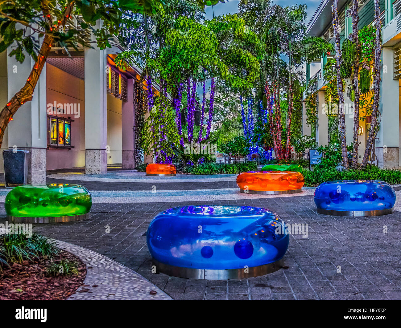 Colorful Modern Plastic Seats At Camana Bay in the Caribbean Around Christmas, Grand Cayman, Cayman Islands Stock Photo