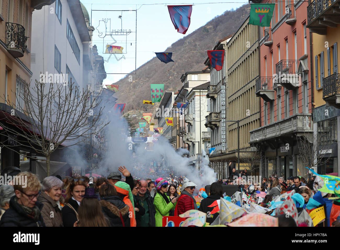 Bellinzona, Switzerland-February 24,2017: Big crowd, marching bands, guggen music and colorful masks at the Rabadan Carnival 2017 opening parade Stock Photo