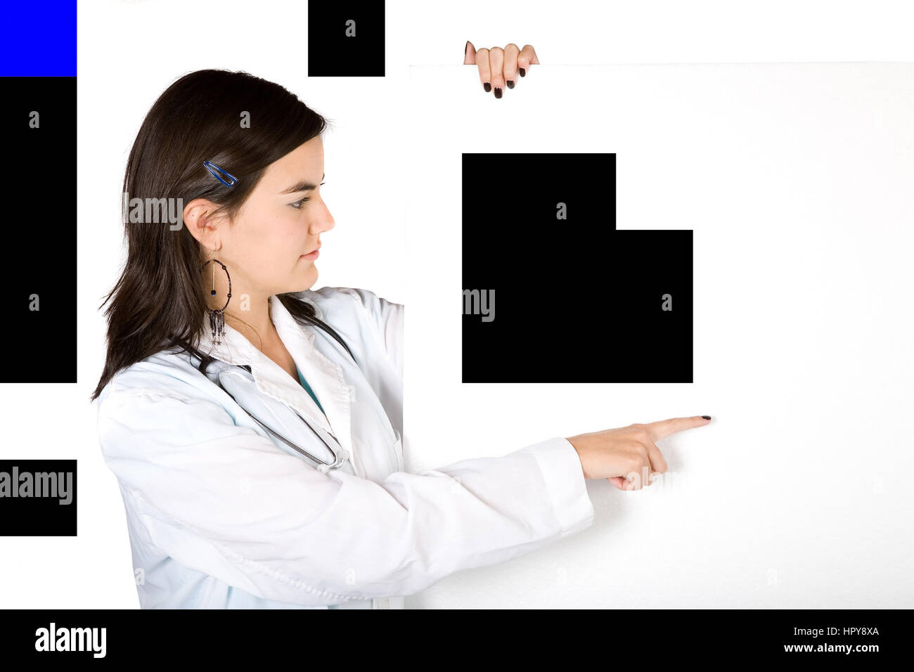 Doctor Point Woman Happy beautiful female doctor point hi-res stock photography and images ...