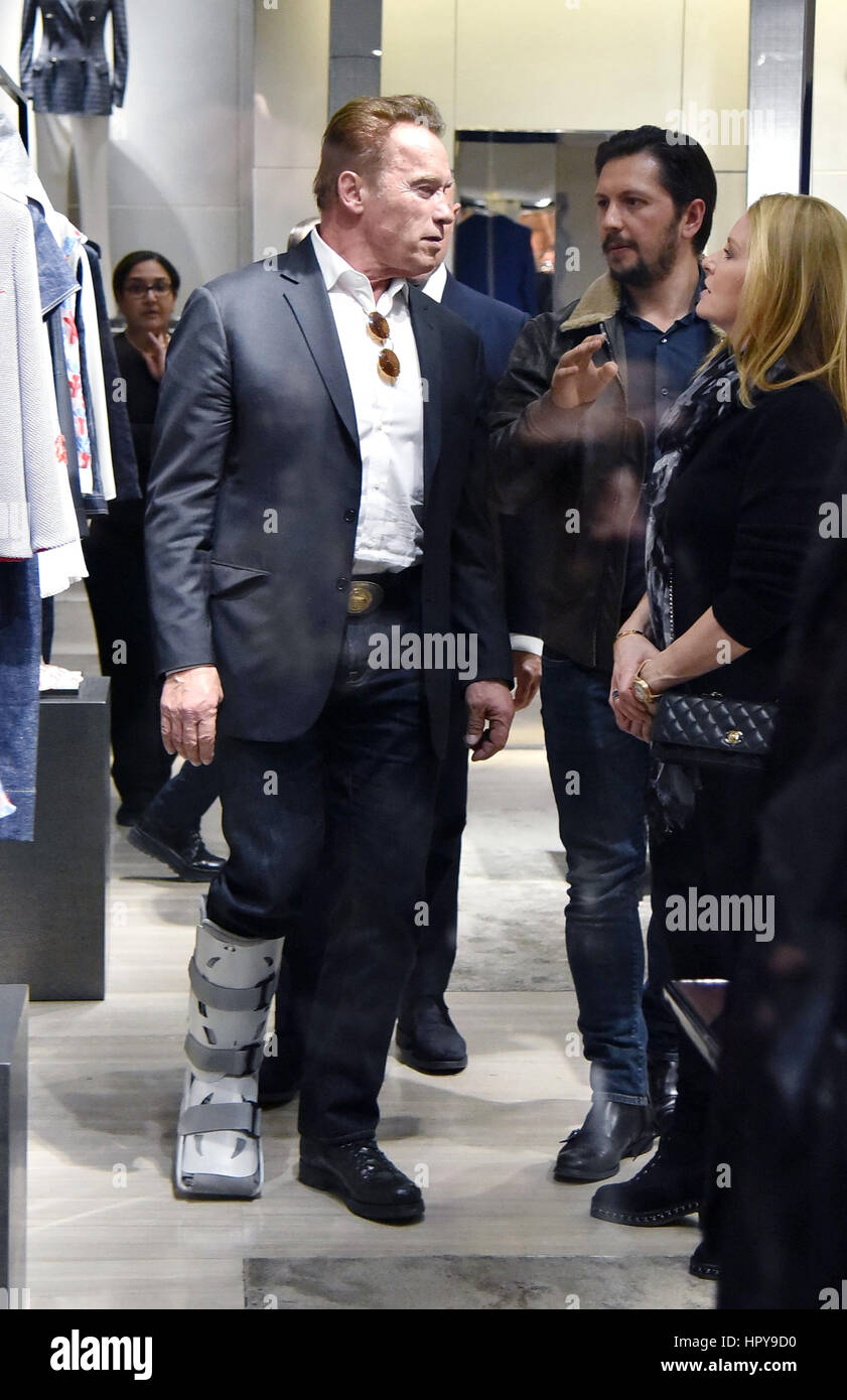Arnold Schwarzenegger and his girlfriend Heather Milligan go shopping at various boutiques in Rome, Italy. Arnold is seen wearing a Air Shield Walker on his right leg and happily walks around the city centre.  Featuring: Arnold Schwarzenegger, Heather Milligan Where: Rome, Italy When: 25 Jan 2017 Credit: IPA/WENN.com  **Only available for publication in UK, USA, Germany, Austria, Switzerland** Stock Photo