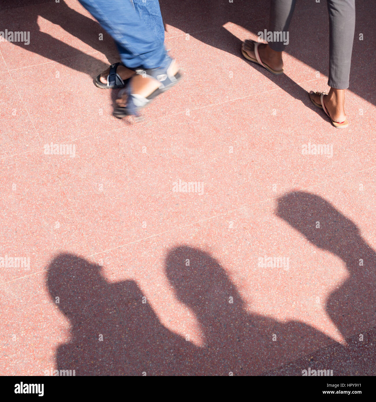 Low section of students walking Stock Photo