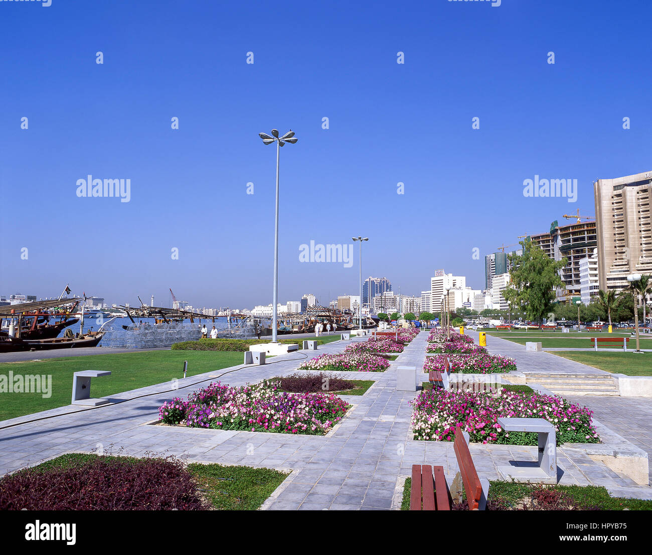 Floral promenade by Dubai Creek, Deira, Dubai, United Arab Emirates Stock Photo