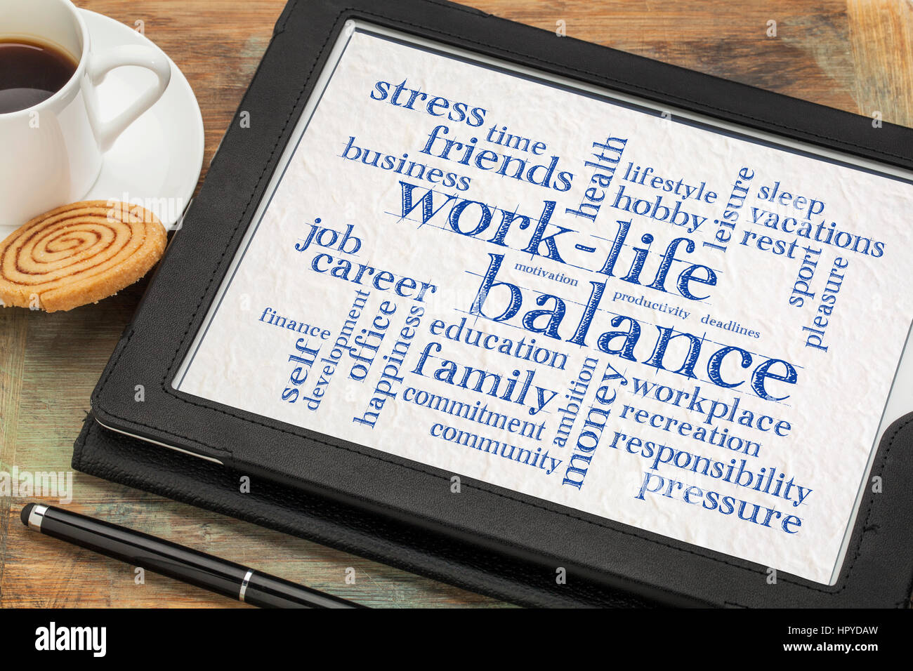 work life balance word cloud - word abstract on a digital tablet with a ...