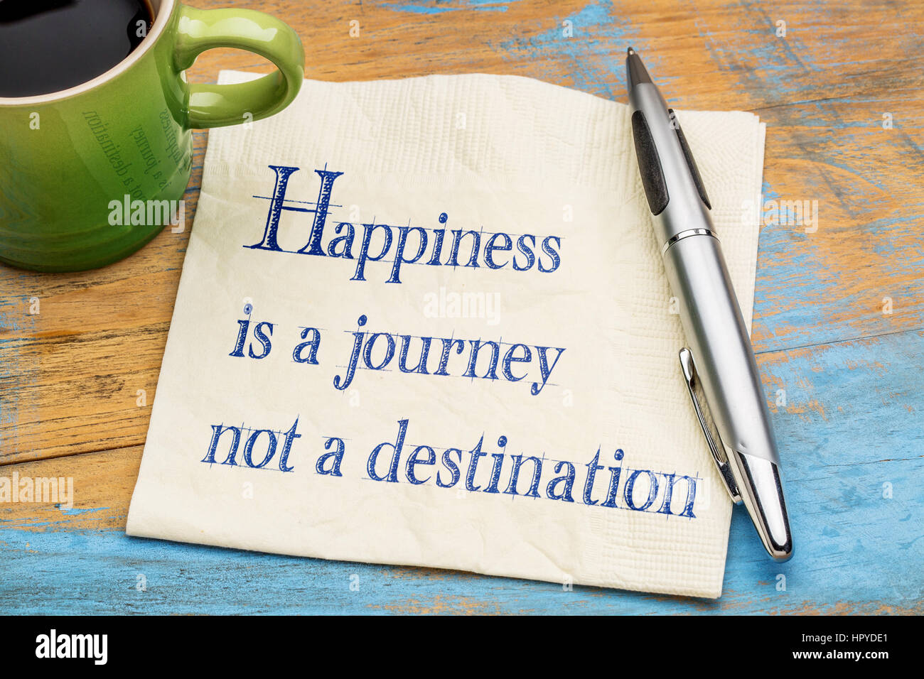 Happiness is a journey, not a destination handwriting on a napkin