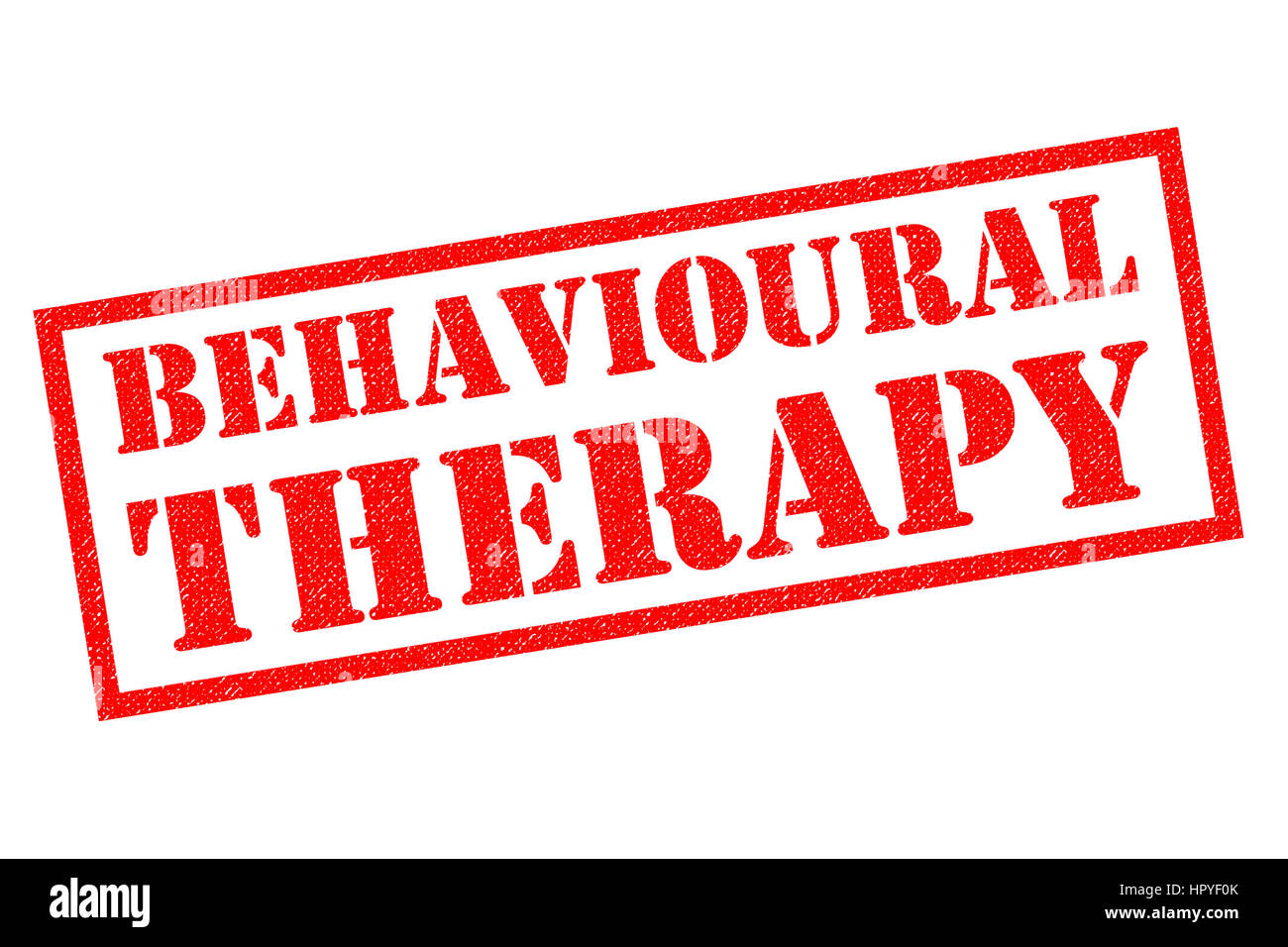 BEHAVIOURAL THERAPY (UK spelling) red Rubber Stamp over a white background. Stock Photo