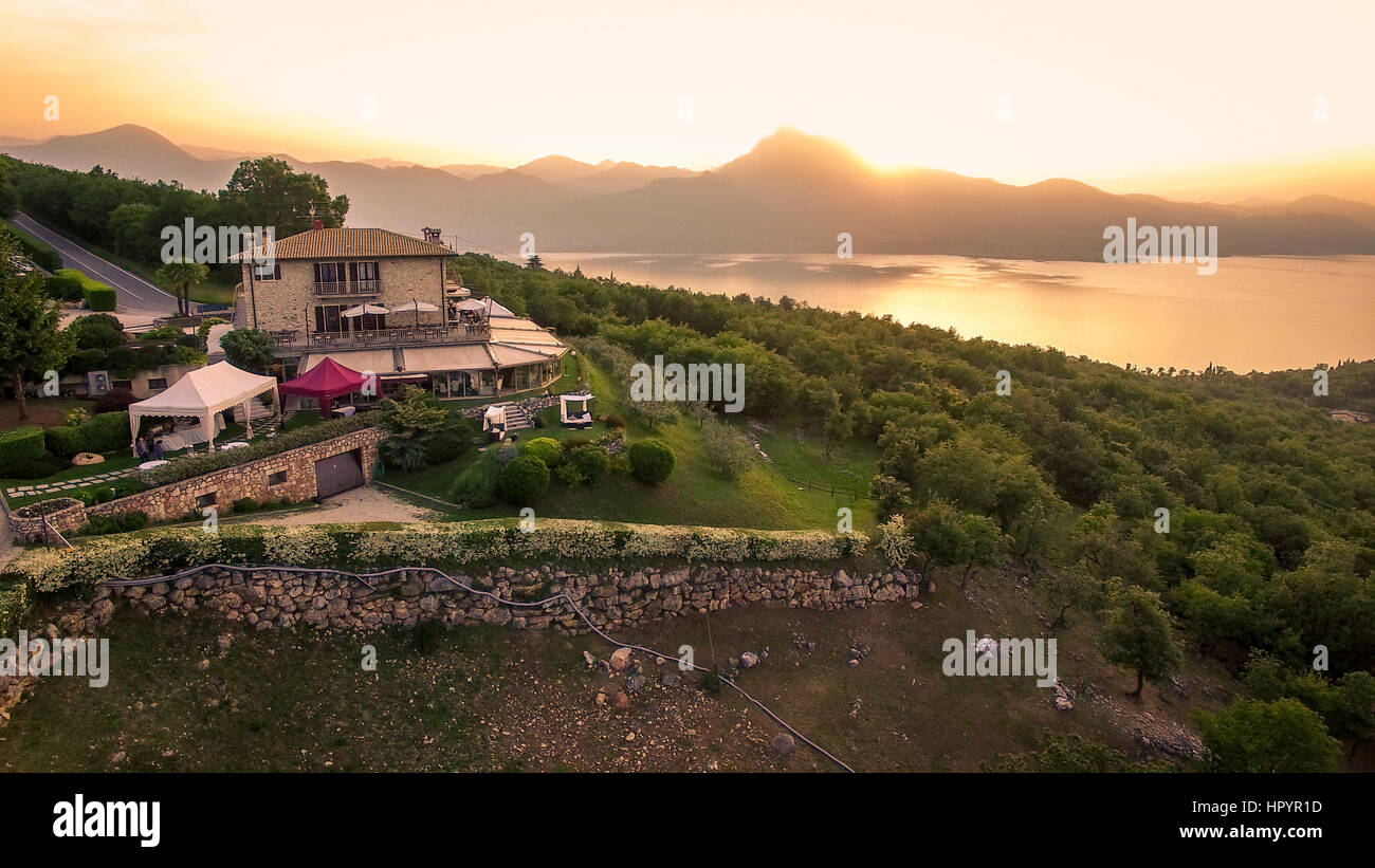 Costermano, Italy - May 22, 2016: Aerial view of the house of spirits, famous restaurant in Costermano, Lake Garda, Italy. Stock Photo